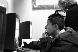 boy sitting at computer